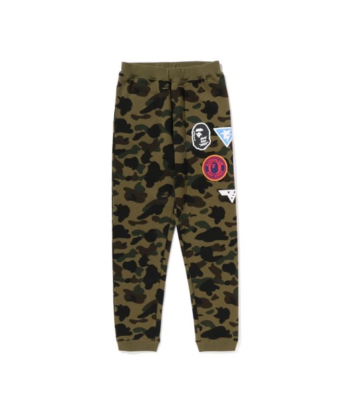 A BATHING APE(アベイシングエイプ)の「1ST CAMO PATCH PRINT SWEAT PANTS(スウェットパンツ・キッズ・イエロー/グリーン・160/150)」の1枚目の写真