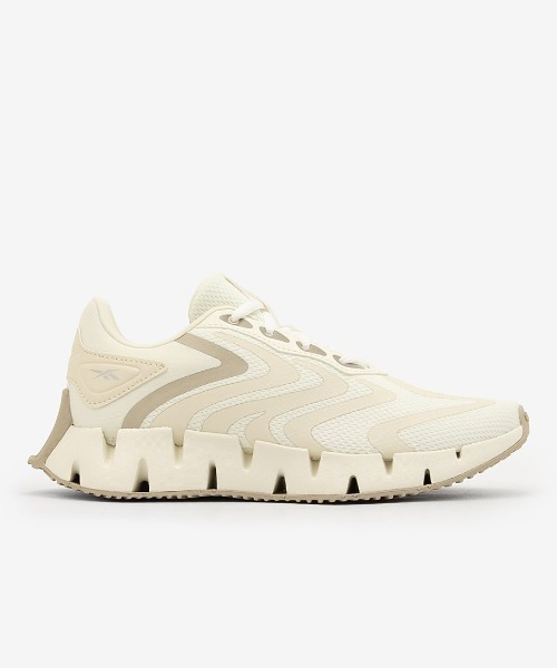 Reebok(リーボック)の「ジグ ライズ / ZIG RISE SA(スニーカー・レディース・アイボリー/ホワイト・22.0cm/25.5cm/25.0cm/24.0cm/24.5cm/23.5cm/23.0cm/22.5cm)」の1枚目の写真