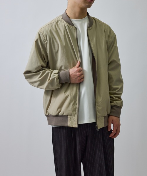 j.n.r.d(ジェー・エヌ・アール・ディー)の「マルチマテリアルリバーシブルブルゾン(MA-1・メンズ・ブラック/ベージュ・L/LL/M/S)」の12枚目の写真