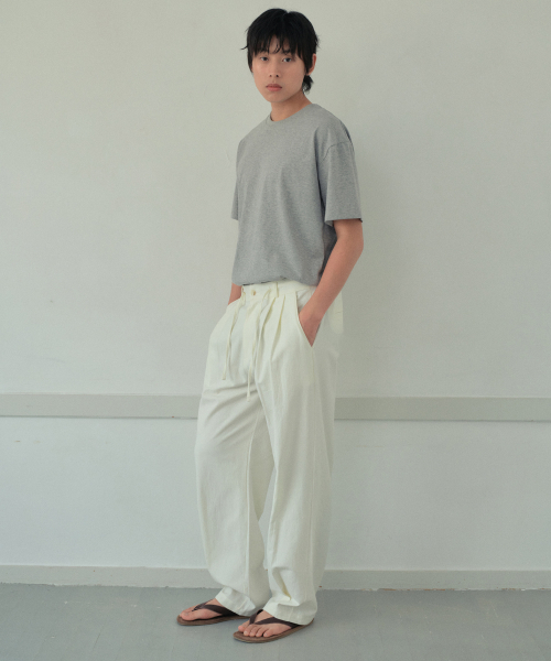 WEDNESDAY OASIS（ウェンズデーオアシス）の「[アトリエスタンダード] ハーフラウンドTシャツ_MELANGE GRAY(WB6TP43)（Tシャツ/カットソー・メンズ・ライトグレー・MEDIUM/LARGE/X-LARGE）」の4枚目の写真
