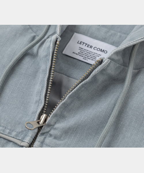 LETTERCOMO(レテルコモ)の「パイピングワークフードジャケットスカイブルー(その他アウター・レディース・スカイブルー・MEDIUM/LARGE)」の3枚目の写真