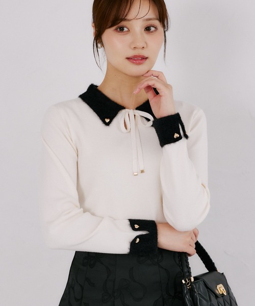 tocco closet(トッコ クローゼット)の「リボン付きフェザー配色ハート釦ニットプルオーバー(ニット/セーター・レディース・アイボリー/ブラウン系その他/ブラック・M)」の1枚目の写真
