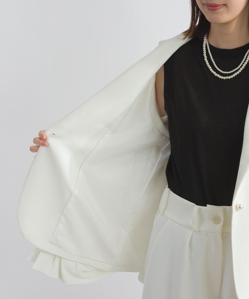 PICCIN PERLA（ピッチンペルラ）の「【セットアップ可能】アシンメトリーフリルジレ（ベスト・レディース・オフホワイト/ブラック・M）」の6枚目の写真