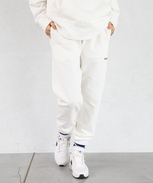 HEREIAM（ヘレイアム）の「【HEREIAM】ワッペンロゴパンツ（スウェットパンツ・レディース・ブラック/ホワイト・MEDIUM/SMALL）」の2枚目の写真