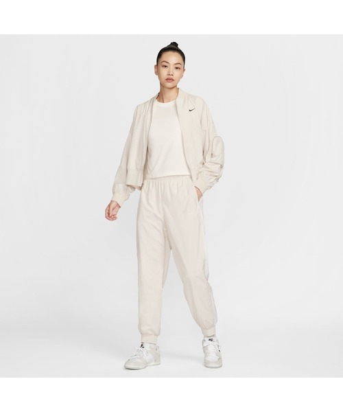 NIKE（ナイキ）の「ナイキ NIKE ナイキ  NSW OTG UV エッセンシャル ウーブン パンツ MR（その他パンツ・レディース・ライトベージュ/ブラック/ホワイト・M/L）」の8枚目の写真