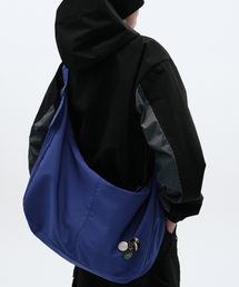 suade（スエード）の「HALFMOON CROSS BAG [PURPLE]（メッセンジャーバッグ）」