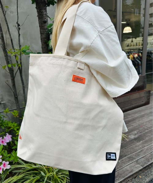 UNIVERSAL PRODUCTS(ユニバーサルプロダクツ)の「UNIVERSAL OVERALL×NEWERA / UO/NE キャンバストート / R1962(トートバッグ・レディース・アイボリー・FREE)」の1枚目の写真