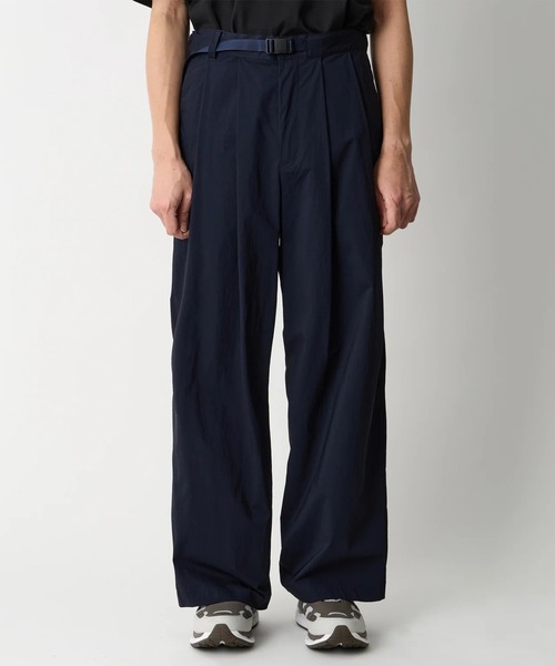 WHITE MOUNTAINEERING(ホワイトマウンテニアリング)の「【White Mountaineering/ホワイトマウンテニアリング】×Dickies 2 TUCK PANTS(チノパンツ・メンズ・ネイビー/ブラック・2/1)」の1枚目の写真