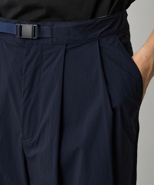 WHITE MOUNTAINEERING(ホワイトマウンテニアリング)の「【White Mountaineering/ホワイトマウンテニアリング】×Dickies 2 TUCK PANTS(チノパンツ・メンズ・ネイビー/ブラック・2/1)」の11枚目の写真