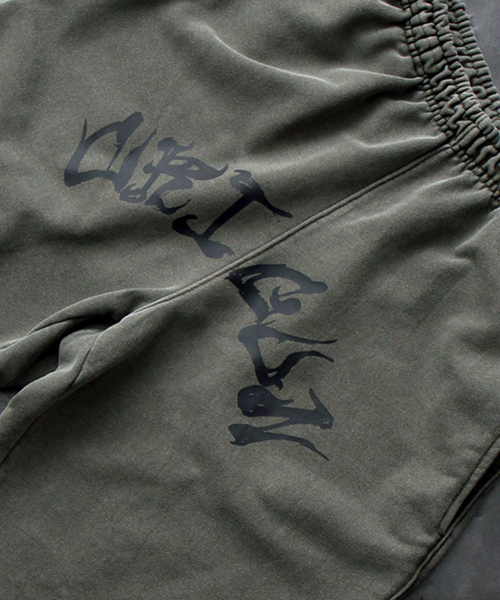 CRIGUN(クリガン)の「アートワークバミューダパンツピグメントKHAKI(その他パンツ・レディース・カーキ・MEDIUM/LARGE/X-LARGE)」の9枚目の写真