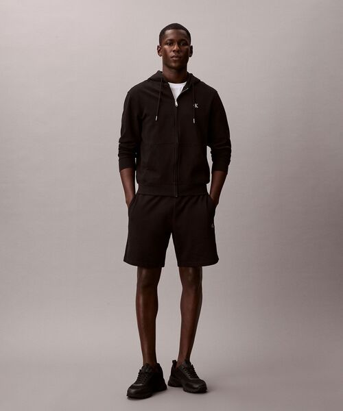 Calvin Klein(カルバン・クライン)の「モノグラム ショートパンツ(その他パンツ・メンズ・ベージュ/ブラック・XL/M/S/L)」の20枚目の写真