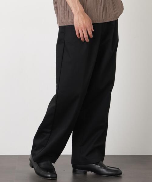 NORMANBROS(ノーマンブロス)の「NORMANBROS/NORMANBROS別注 2タックパンツ(その他パンツ・メンズ・ベージュ/ブラック・M/L)」の1枚目の写真