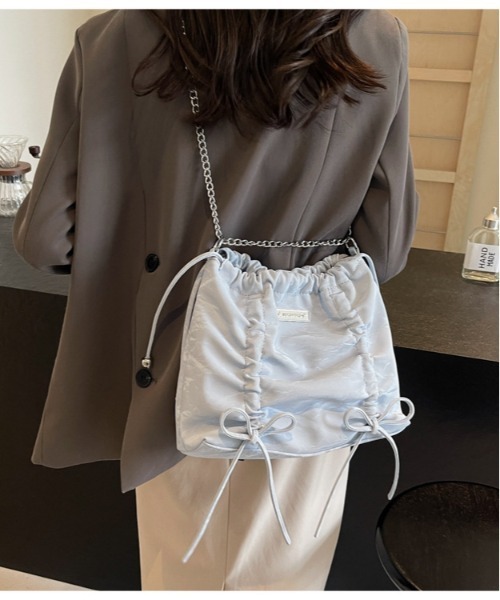 FREE STYLISTS(フリー スタイリスト)の「Y2K 紐リボン2way 巾着 バケットバッグ ショルダーバッグ(ショルダーバッグ・レディース・ブルー/オフホワイト/グレー/ブラック・FREE)」の1枚目の写真