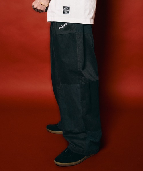 NineMicrophones(ナインマイクロフォンズ)の「PATCHWORK BAGGY PANTS(その他パンツ・メンズ・オリーブ/ブラック・X-LARGE/LARGE/MEDIUM/SMALL)」の6枚目の写真