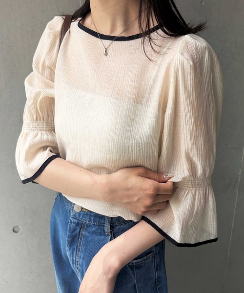 GeeRA(ジーラ)の「夏にぴったり。キャンディースリーブ配色パイピングシアーブラウス(シャツ/ブラウス・レディース・アイボリー/ブラック・LARGE/MEDIUM)」の2枚目の写真