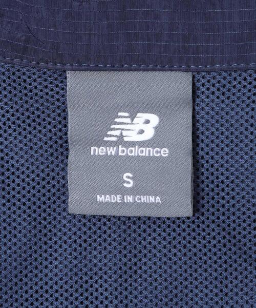 NEW BALANCE(ニューバランス)の「NEW BALANCE スポーツレガシージャケット(ナイロンジャケット・レディース・ネイビー・MEDIUM)」の7枚目の写真