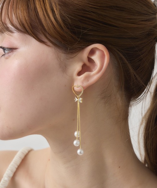 Siel(シエル)の「リボンモチーフロングピアス(ピアス(両耳用)・レディース・シルバー/ゴールド系その他/シルバー系その他/ゴールド・FREE)」の1枚目の写真