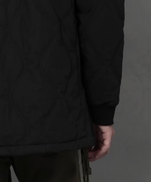 WHITE MOUNTAINEERING（ホワイトマウンテニアリング）の「【White Mountaineering】PRIMALOFT キルトレースアッププルオーバージャケット（ミリタリージャケット・メンズ・ブラック/カーキ・1/2/3）」の13枚目の写真