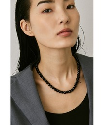 un/neu（アンノイ）の「カラーボールネックレス/ステンレススチール（ネックレス・レディース）」