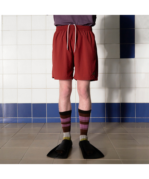 UNALLOYED(アナロイド)の「ロゴナイロンショーツ / ブリック(その他パンツ・メンズ・その他・MEDIUM/LARGE)」の1枚目の写真