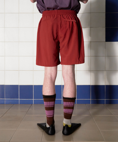 UNALLOYED(アナロイド)の「ロゴナイロンショーツ / ブリック(その他パンツ・メンズ・その他・MEDIUM/LARGE)」の3枚目の写真