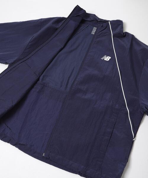 NEW BALANCE(ニューバランス)の「NEW BALANCE スポーツレガシージャケット(ナイロンジャケット・レディース・ネイビー・MEDIUM)」の4枚目の写真