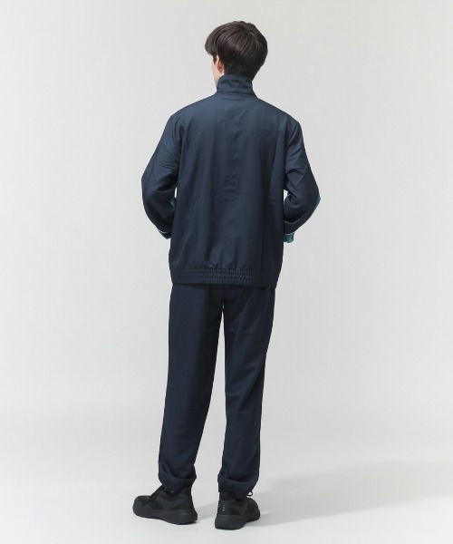 PUMA(プーマ)の「【別注】プーマ PUMA ウーブン カラーブロック スーツ 限定コラボ(ジャージ・メンズ・ネイビー/ブラック・S/M/L/LL/3L)」の5枚目の写真