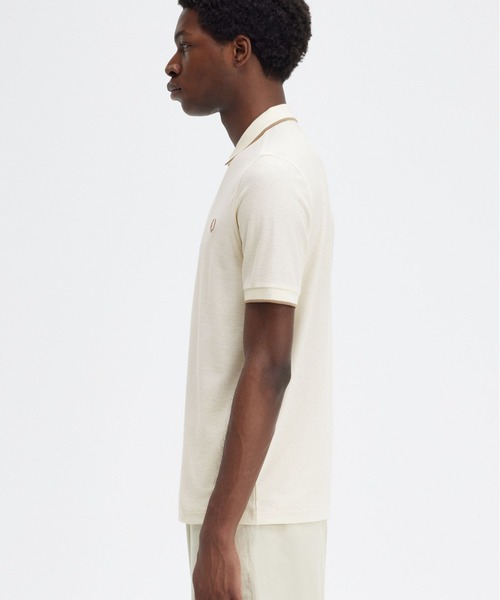 FRED PERRY（フレッドペリー）の「Crepe Pique Zip Neck Polo Shirt（ポロシャツ・メンズ・ブラック/ホワイト・M/L）」の4枚目の写真
