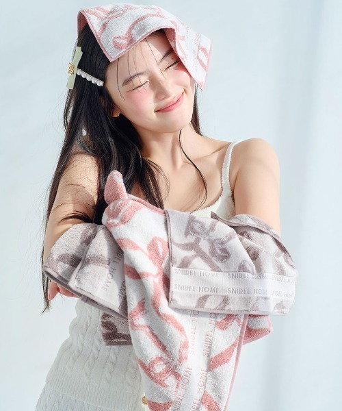 SNIDEL HOME(スナイデルホーム)の「リボンジャカードハンドタオル(タオル・レディース・ピンク/モカ・FREE)」の6枚目の写真