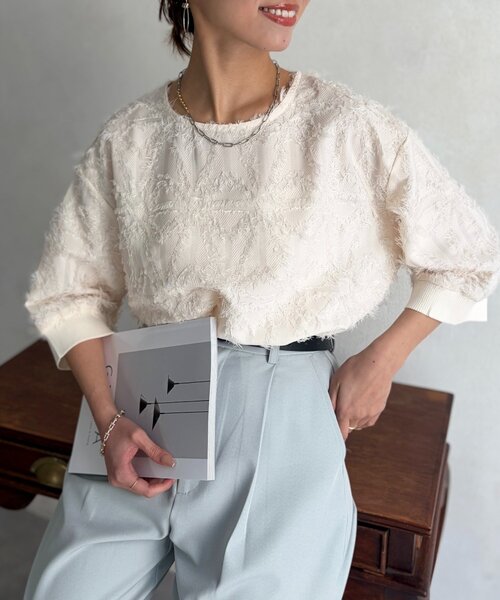 Chez toi(シェトワ)の「リブ切替花柄JQプルオーバー(シャツ/ブラウス・レディース・ブラック/オレンジ/ホワイト系その他・FREE)」の1枚目の写真