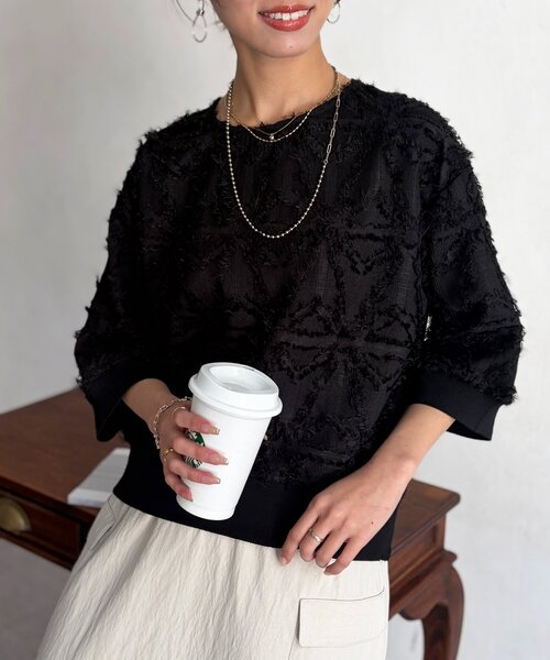 Chez toi(シェトワ)の「リブ切替花柄JQプルオーバー(シャツ/ブラウス・レディース・ブラック/オレンジ/ホワイト系その他・FREE)」の2枚目の写真