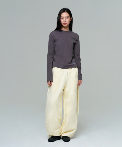 ERA(エラ)の「UNISEX ERA WIDE JOGGER SWEATPANTS - LEMON CREAM(スウェットパンツ・レディース・クリーム・LARGE/MEDIUM/SMALL)」の7枚目の写真