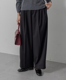 組曲（クミキョク）の「ハンサムツイルカーヴィーパンツ（その他パンツ）」