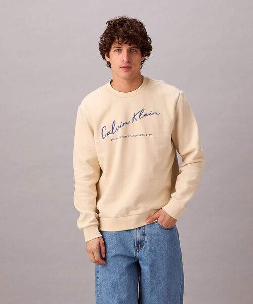 Calvin Klein(カルバン・クライン)の「【ユニセックス】ロゴエンブロイダリークルーネックスウェットシャツ(スウェット・メンズ・ネイビー/ベージュ・S/M/L)」の2枚目の写真