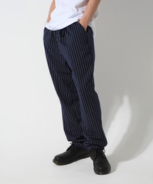 GOSTAR DE FUGA | ポンチ素材細ストライプデザインテーパードパンツ(その他パンツ)
