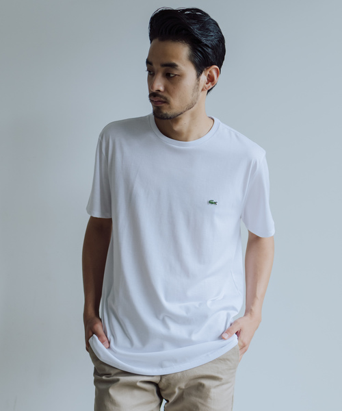 LACOSTE(ラコステ)の「【Holiday】LACOSTE コットンロゴTシャツ(Tシャツ/カットソー・レディース・ホワイト/ブラック・MEDIUM/LARGE/SMALL)」の1枚目の写真