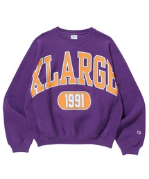 XLARGE（エクストララージ）の「XLARGE x Champion COLLEGE RAGLAN CREWNECK SWEAT（スウェット・メンズ）」