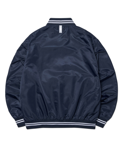 NOMANUAL(NOMANUAL)の「ARCH LOGO VARSITY JACKET - NAVY(スタジャン・レディース・その他・LARGE/SMALL/MEDIUM)」の2枚目の写真