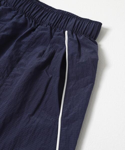 NEW BALANCE（ニューバランス）の「NEW BALANCE　スポーツレガシースカート（スカート・レディース・ネイビー・SMALL）」の2枚目の写真