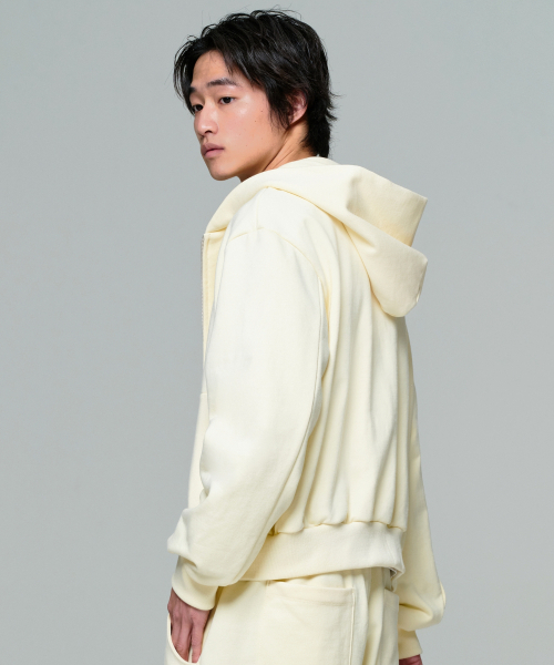 ERA（エラ）の「UNISEX ERA OVERSIZED HOODED ZIP-UP - LEMON CREAM（パーカー・レディース・クリーム・LARGE/MEDIUM/SMALL）」の12枚目の写真
