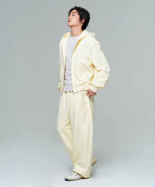 ERA（エラ）の「UNISEX ERA OVERSIZED HOODED ZIP-UP - LEMON CREAM（パーカー・レディース・クリーム・LARGE/MEDIUM/SMALL）」の10枚目の写真