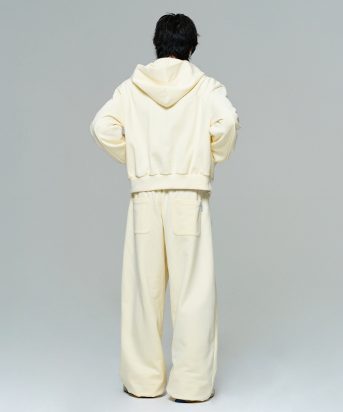 ERA（エラ）の「UNISEX ERA OVERSIZED HOODED ZIP-UP - LEMON CREAM（パーカー・レディース・クリーム・LARGE/MEDIUM/SMALL）」の9枚目の写真