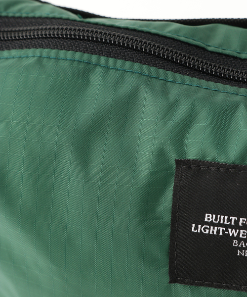 BAGSINPROGRESS（バッグズインプログレス）の「【BAGS IN PROGRESS】FANNYPACK CROSSBODY J：ショルダーバッグ（ショルダーバッグ・レディース・グリーン/ネイビー・FREE）」の11枚目の写真