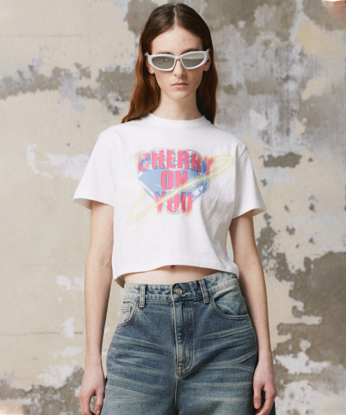 DNSR WOMEN(ディーエヌエスアールウーマン)の「ハートグラフィッククロップTシャツホワイト(Tシャツ/カットソー・レディース・その他・SMALL/MEDIUM)」の1枚目の写真