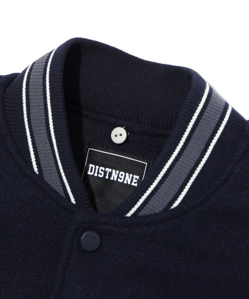 DISTN9NE（ディストナイン）の「ロゴバスティパディングジャンパー NAVY (LP1JU017-066)（スタジャン・メンズ・その他・90/95/100/105）」の3枚目の写真