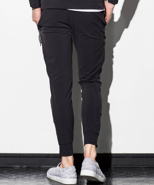AKM Contemporary（エイケイエムコンテンポラリー）の「AKM Contemporary(エイケイエムコンテンポラリー)ナイロン4wayラインストーンzipパンツ（その他パンツ・メンズ・ブラック・SMALL/MEDIUM/LARGE/X-LARGE）」の9枚目の写真