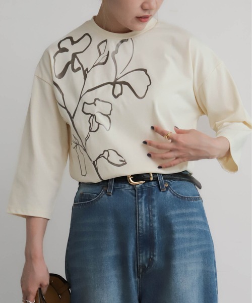 NOMBRE IMPAIR(ノンブルアンペール)の「ラインフラワー箔PT 8分袖TEE(Tシャツ/カットソー・レディース・ネイビー/ホワイト・FREE)」の1枚目の写真