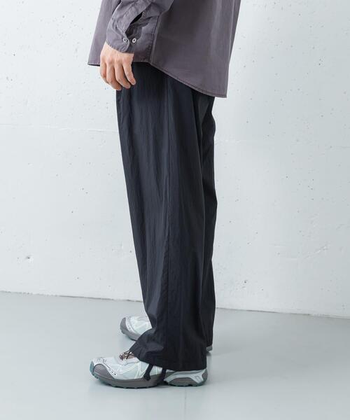 ANOTHER OFFICE(アナザー オフィス)の「ANOTHER OFFICE FLOW BANDING EASY PANTS(その他パンツ・メンズ・ブラック・3/2)」の5枚目の写真