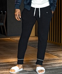 1PIU1UGUALE3  RELAX （ウノピゥウノウグァーレトレ リラックス）の「1PIU1UGUALE3 RELAX(ウノピゥウノウグァーレトレ リラックス)バイカラースマートシルエット ニットロングパンツ(保温性/伸縮性)（スウェットパンツ）」