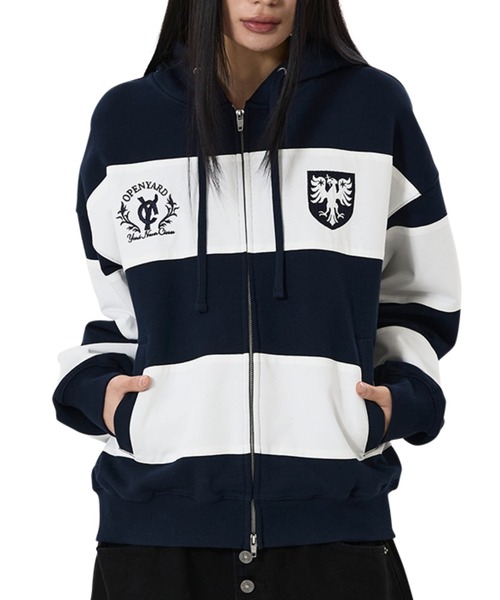 OY(オーワイ)の「『OY/オーワイ』STRIPE EMBLEM HOODIE ZIP UP/ボーダーエンブレムジップアップパーカー(パーカー・レディース・グレー/ネイビー・L/M)」の1枚目の写真